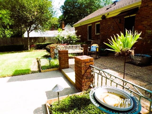 3249 Clarke Road Memphis, TN 38115 - Photo 21 of 24 a view of a house with backyard and sitting area