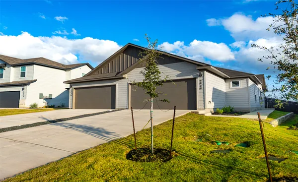 a house view with a backyard space