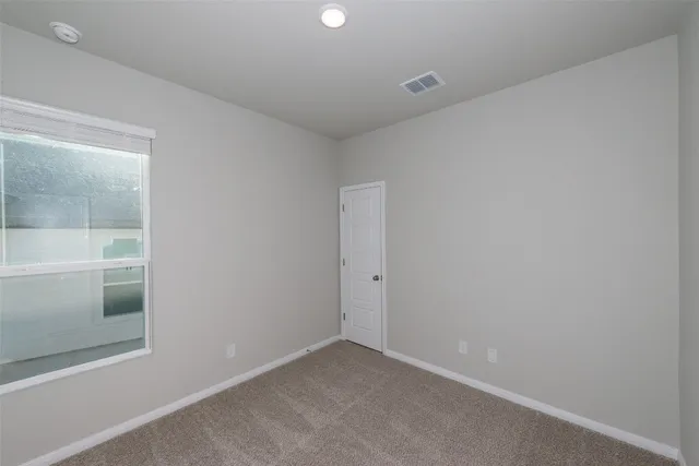 an empty room with a window