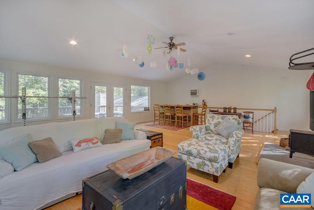 2608 Rio Mills Road Earlysville, VA 22936 - Photo 14 of 38 a living room with furniture and a large window