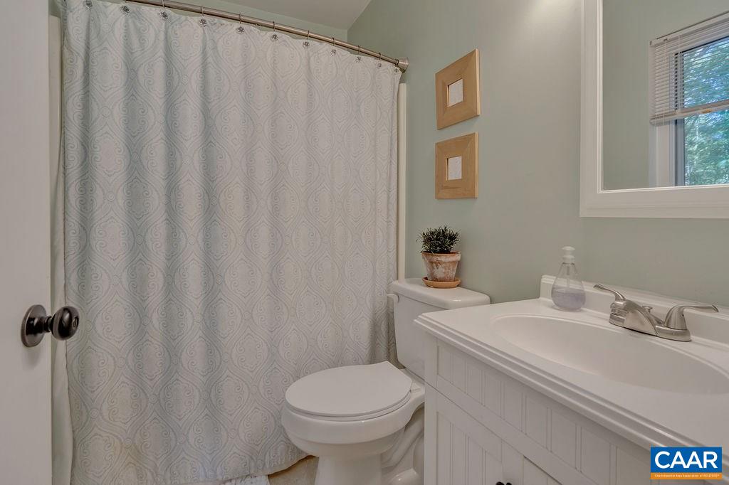 2608 Rio Mills Road Earlysville, VA 22936 - Photo 17 of 38 a bathroom with a sink and a toilet