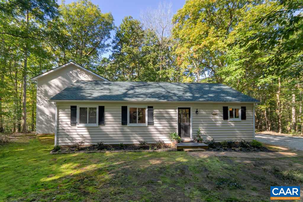 2608 Rio Mills Road Earlysville, VA 22936 - Photo 2 of 38 a front view of a house with yard