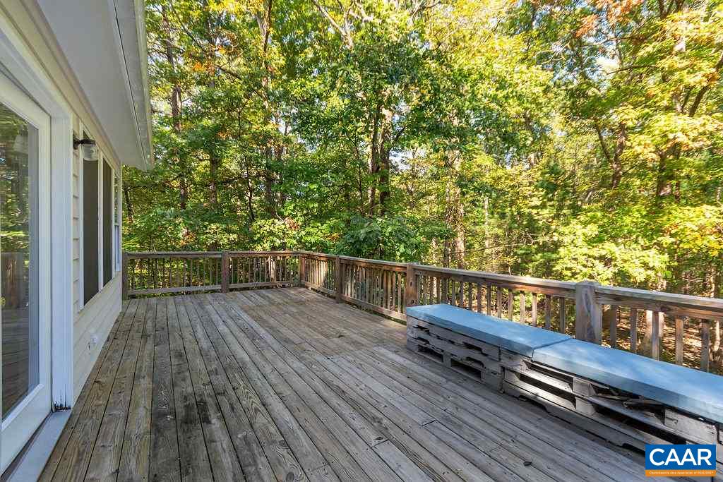 2608 Rio Mills Road Earlysville, VA 22936 - Photo 25 of 38 a view of balcony with wooden floor and fence