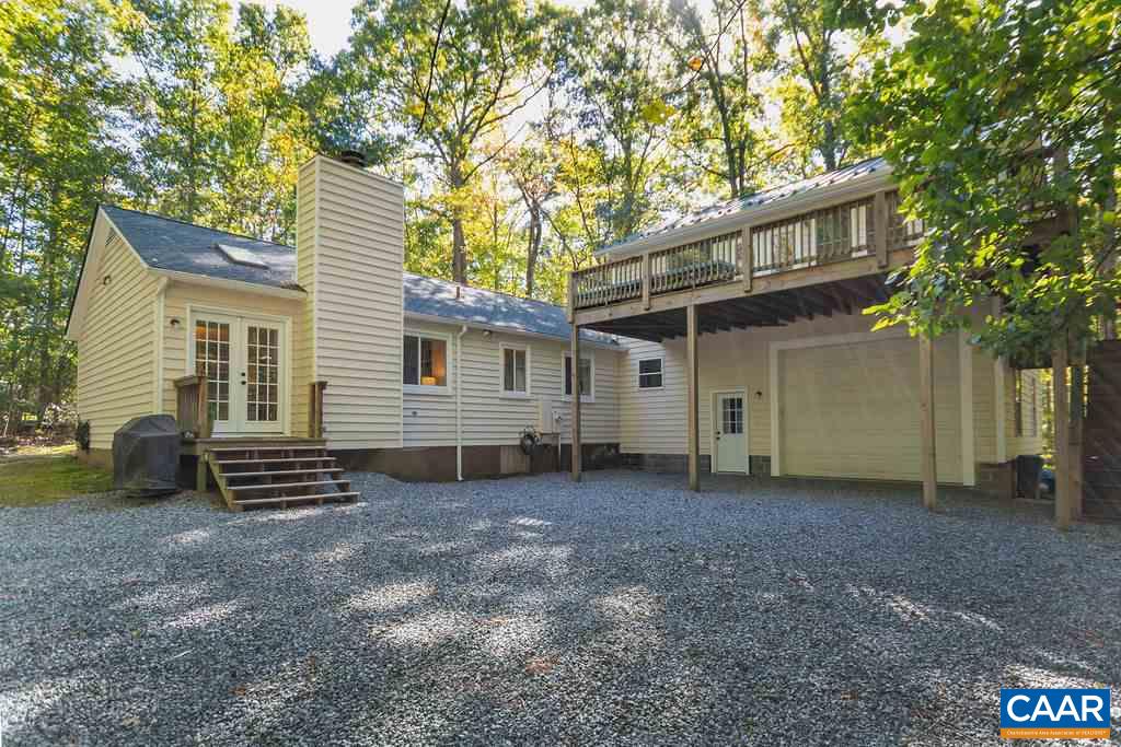 2608 Rio Mills Road Earlysville, VA 22936 - Photo 3 of 38 a view of a house with a yard and tree s