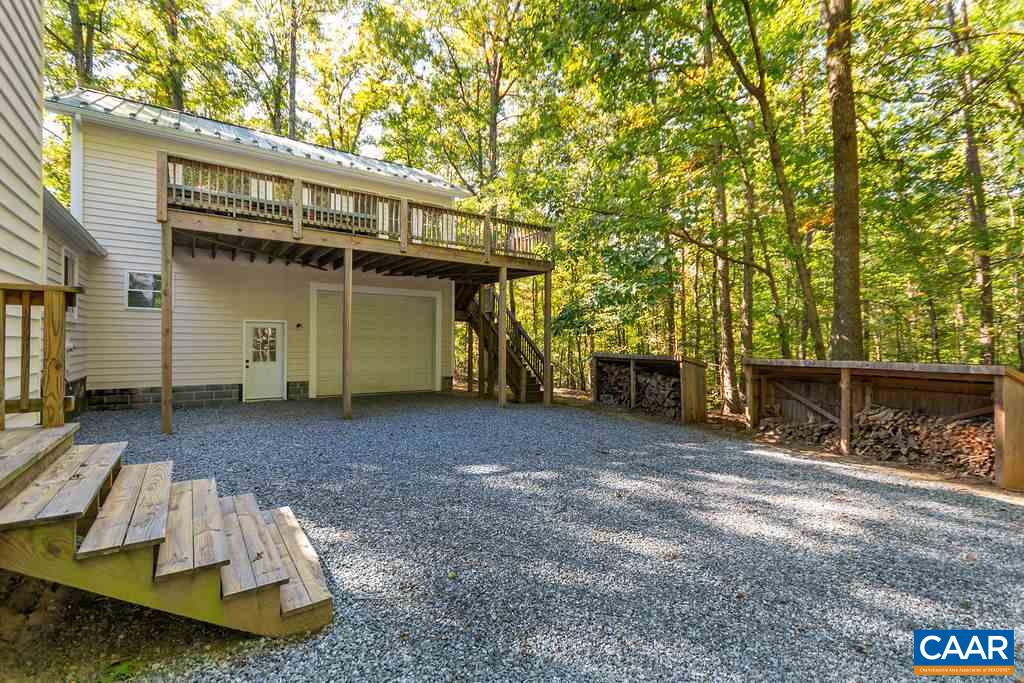 2608 Rio Mills Road Earlysville, VA 22936 - Photo 34 of 38 a view of a house with a yard