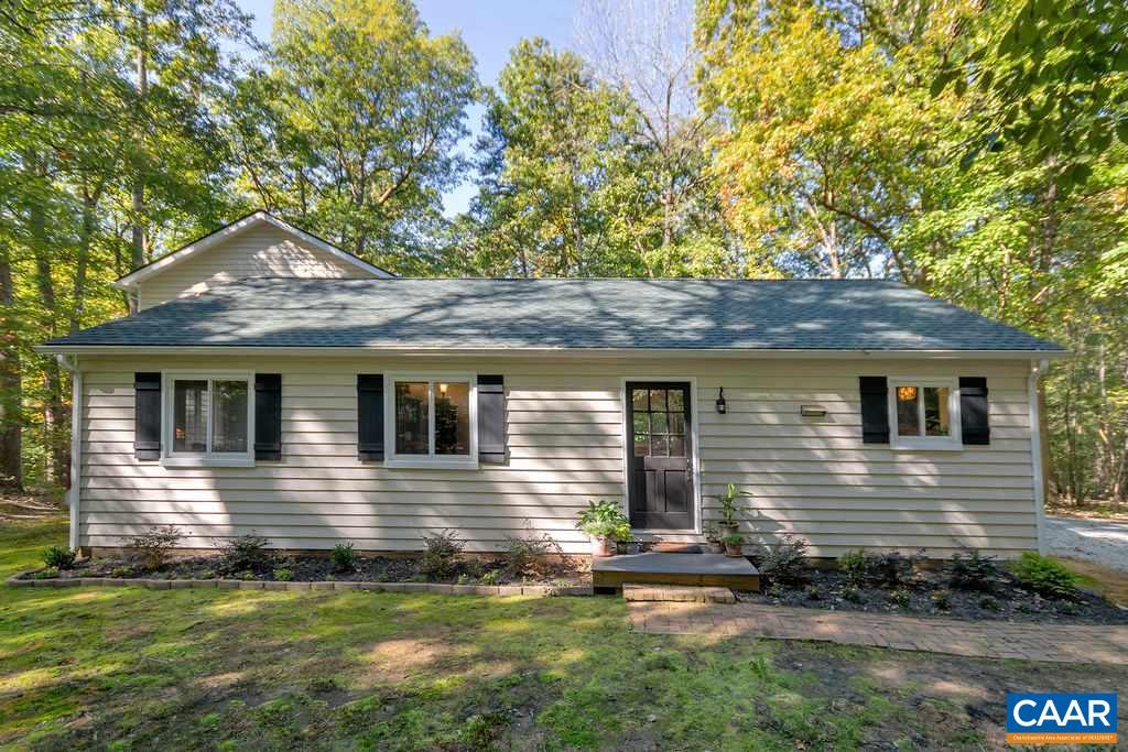 2608 Rio Mills Road Earlysville, VA 22936 - Photo 36 of 38 a front view of a house with a yard