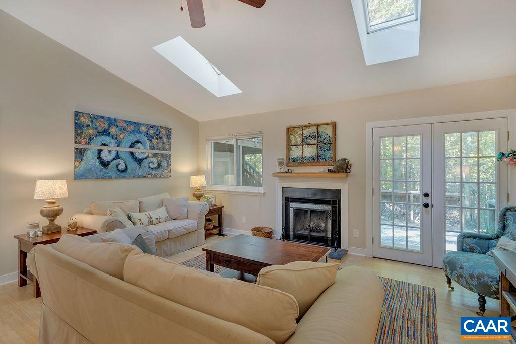 2608 Rio Mills Road Earlysville, VA 22936 - Photo 5 of 38 a living room with furniture and a fireplace