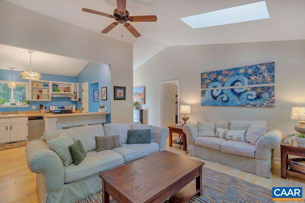 2608 Rio Mills Road Earlysville, VA 22936 - Photo 6 of 38 a living room with furniture and kitchen view