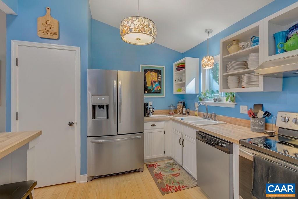 2608 Rio Mills Road Earlysville, VA 22936 - Photo 10 of 38 a kitchen with a refrigerator a stove a sink and dishwasher