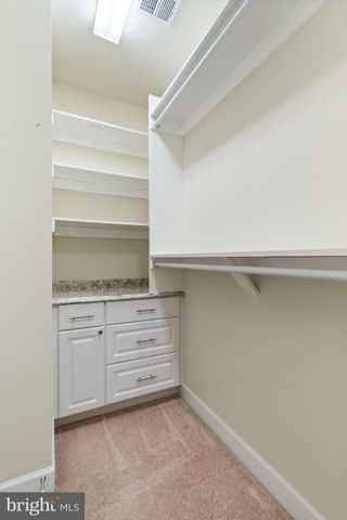 a kitchen with cabinets appliances