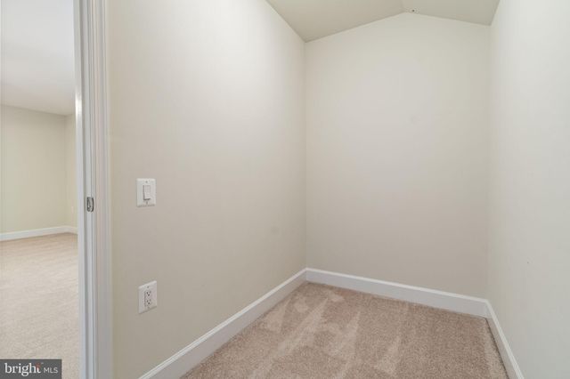 a view of balcony with wooden floor