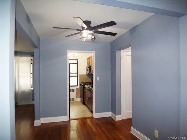 a view of a livingroom with wooden floor
