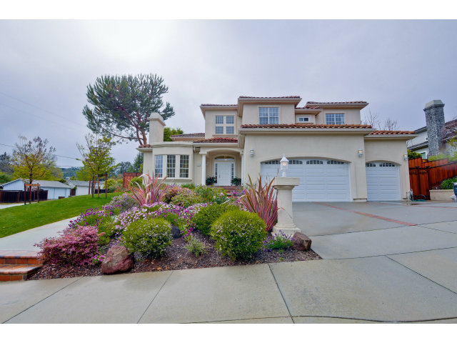 a front view of a building with garden