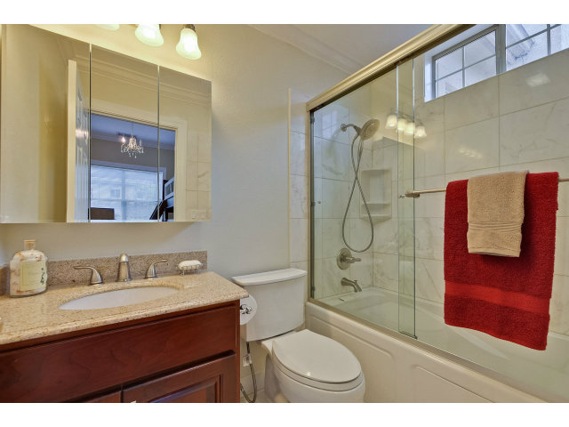 10171 Carmen Road Cupertino, CA 95014 - Photo 22 of 25 a bathroom with a sink a toilet and shower