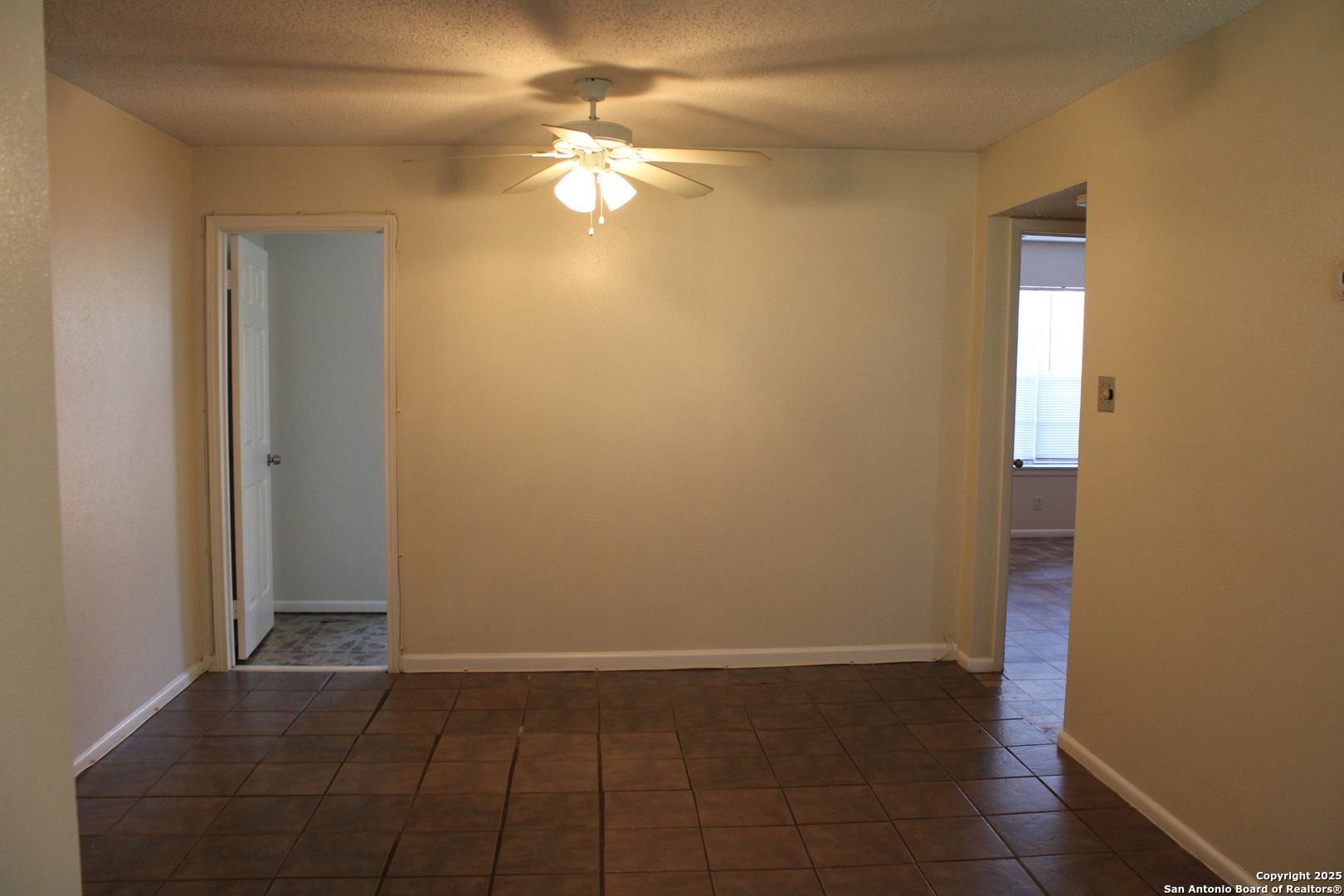 923 Vance Jackson Road, Unit 1007 San Antonio, TX 78201 - Photo 24 of 43 a view of a livingroom with wooden floor and a bathroom