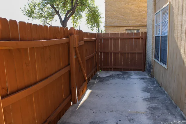 a view of a house with a backyard space