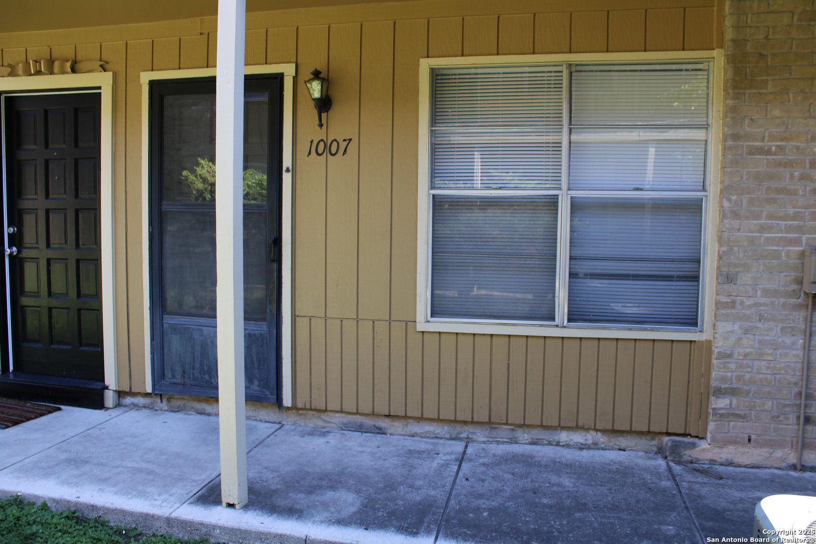 923 Vance Jackson Road, Unit 1007 San Antonio, TX 78201 - Photo 28 of 43 a view of a house with a backyard space