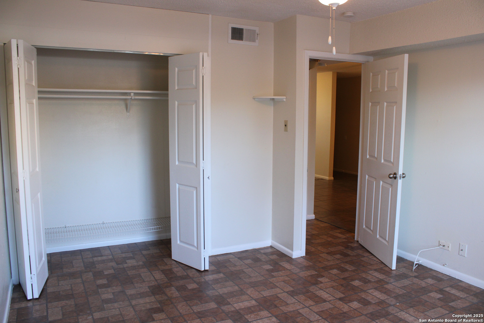923 Vance Jackson Road, Unit 1007 San Antonio, TX 78201 - Photo 42 of 43 a view of an empty room with closet area