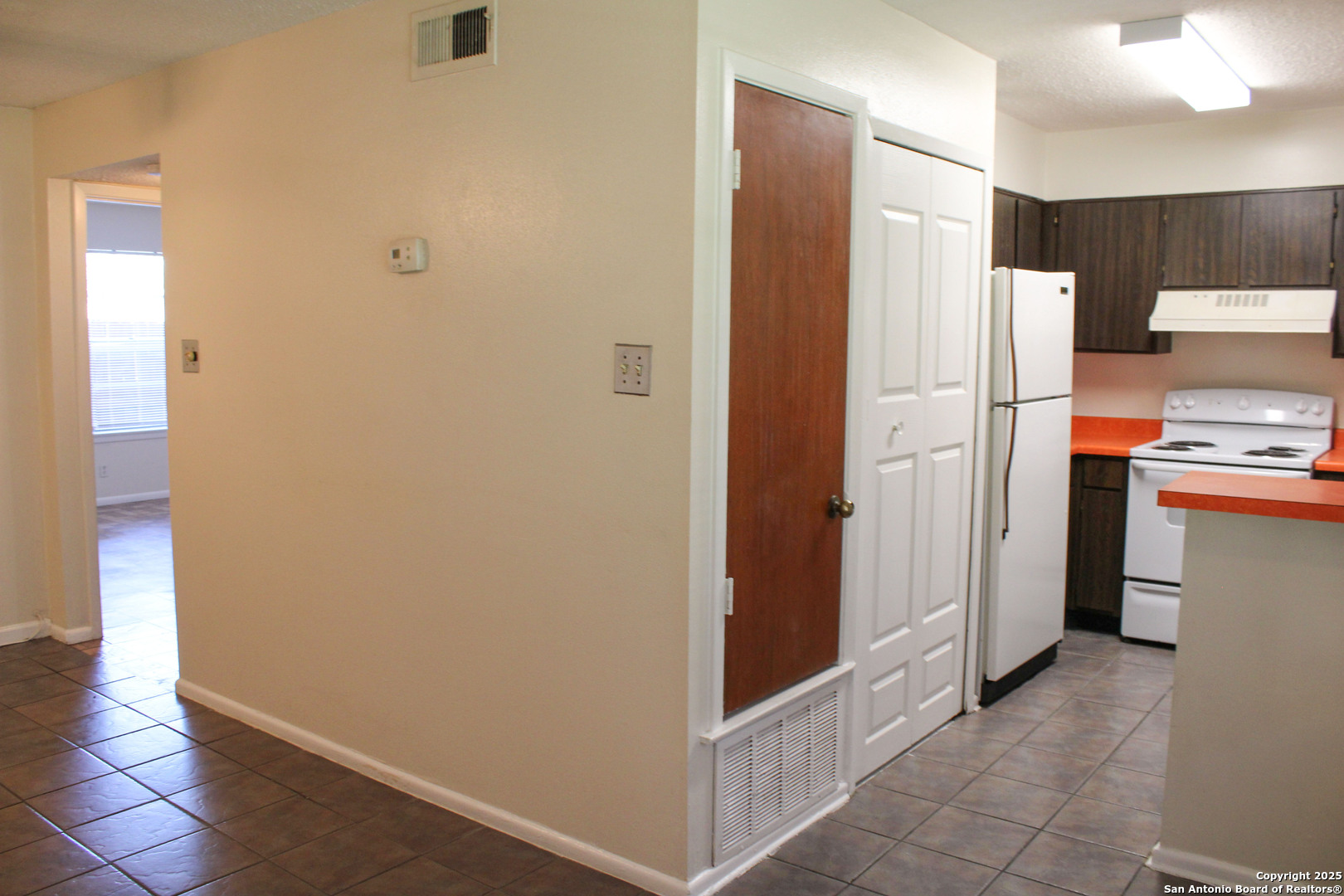 923 Vance Jackson Road, Unit 1007 San Antonio, TX 78201 - Photo 7 of 43 a view of kitchen with cabinets and stainless steel appliances