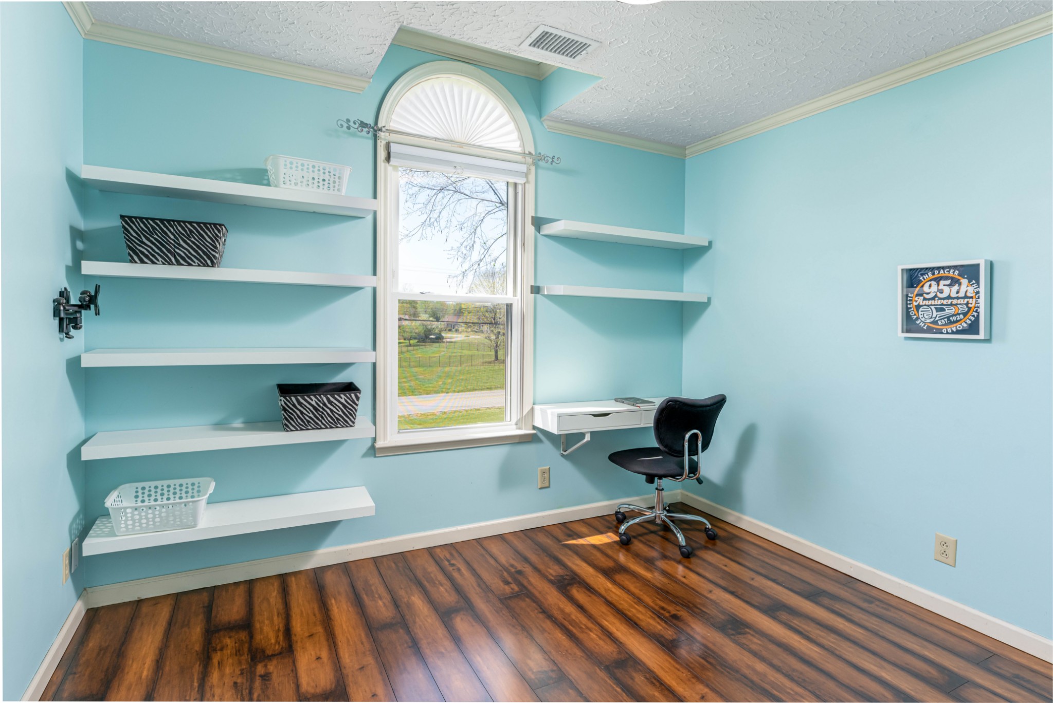 2011 Bradbury Road Adams, TN 37010 - Photo 6 of 46 a view of a workspace with furniture and a window