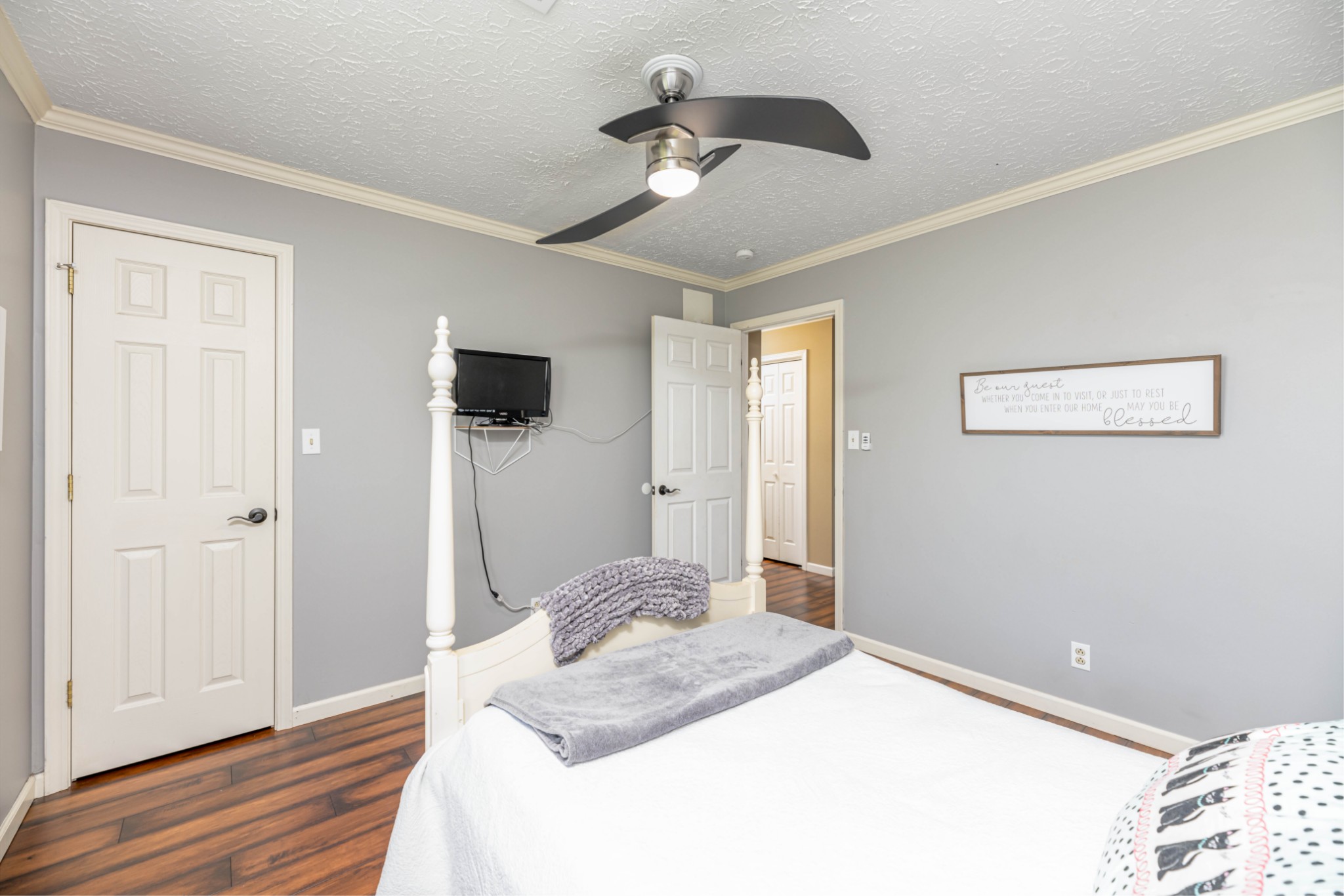 2011 Bradbury Road Adams, TN 37010 - Photo 10 of 46 a bedroom with a bed and wooden floor