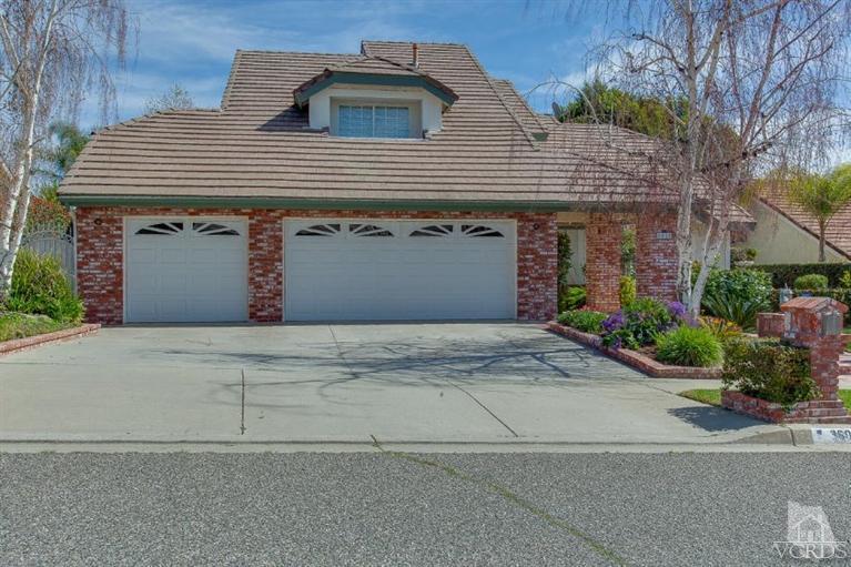 3606 Claridge Court Simi Valley, CA 93063 - Photo 1 of 58 a front view of a house with a garden