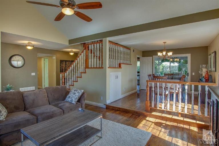 3606 Claridge Court Simi Valley, CA 93063 - Photo 11 of 58 a living room with furniture and a chandelier