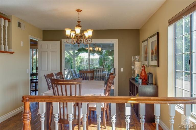3606 Claridge Court Simi Valley, CA 93063 - Photo 12 of 58 a view of a dining room with furniture large windows and wooden floor