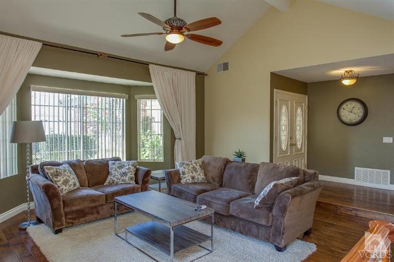 3606 Claridge Court Simi Valley, CA 93063 - Photo 14 of 58 a living room with furniture a ceiling fan and a large window