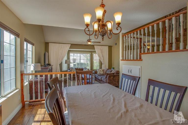 3606 Claridge Court Simi Valley, CA 93063 - Photo 15 of 58 a view of a dining room with furniture window and wooden floor