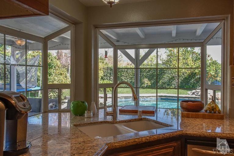 3606 Claridge Court Simi Valley, CA 93063 - Photo 21 of 58 a living room with furniture and a floor to ceiling window