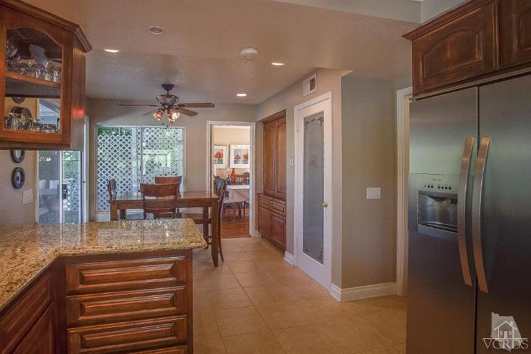 3606 Claridge Court Simi Valley, CA 93063 - Photo 22 of 58 a kitchen with stainless steel appliances granite countertop a refrigerator and a sink