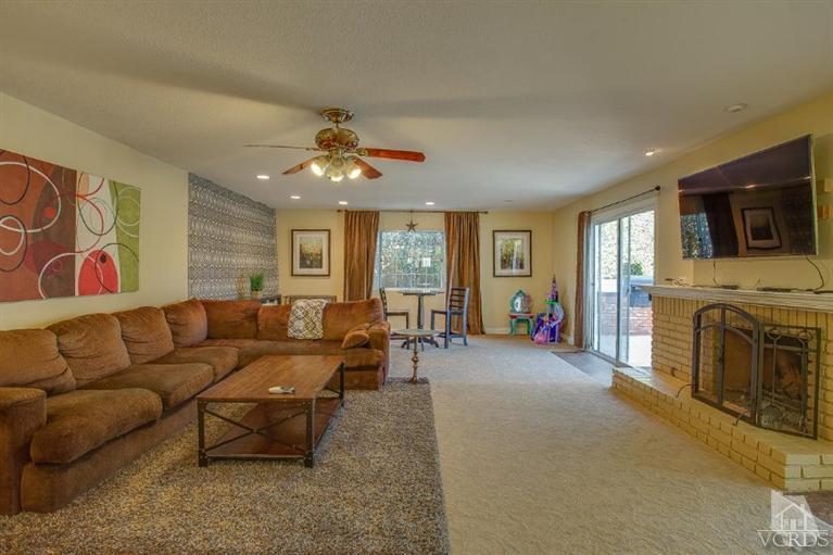 3606 Claridge Court Simi Valley, CA 93063 - Photo 23 of 58 a living room with furniture and a flat screen tv