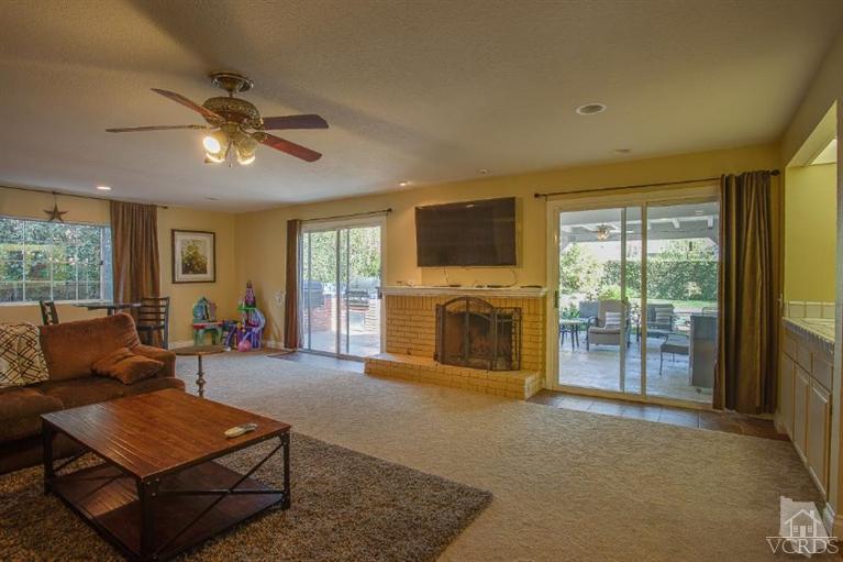 3606 Claridge Court Simi Valley, CA 93063 - Photo 25 of 58 a living room with furniture and a fireplace