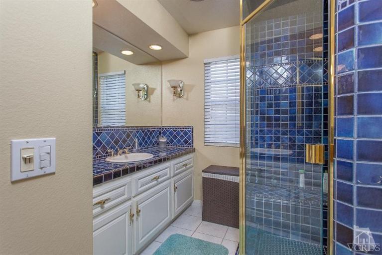 3606 Claridge Court Simi Valley, CA 93063 - Photo 34 of 58 a bathroom with a sink a toilet and shower