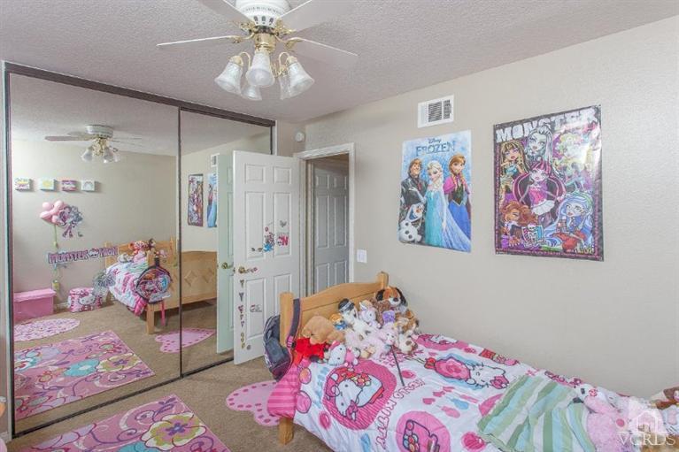 3606 Claridge Court Simi Valley, CA 93063 - Photo 38 of 58 a bedroom with a bed dresser and window