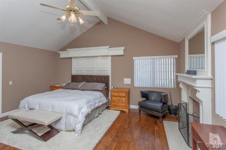 3606 Claridge Court Simi Valley, CA 93063 - Photo 39 of 58 a bedroom with a bed furniture and a fireplace