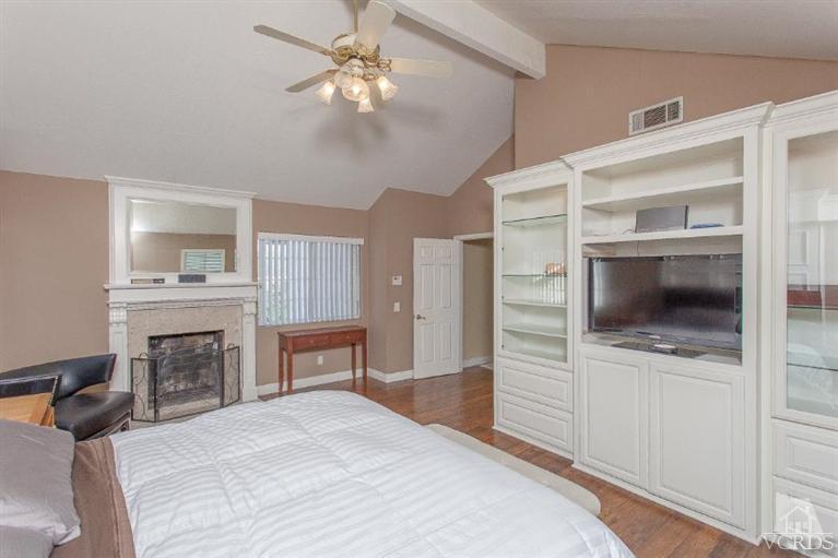 3606 Claridge Court Simi Valley, CA 93063 - Photo 41 of 58 a bedroom with furniture and a fireplace