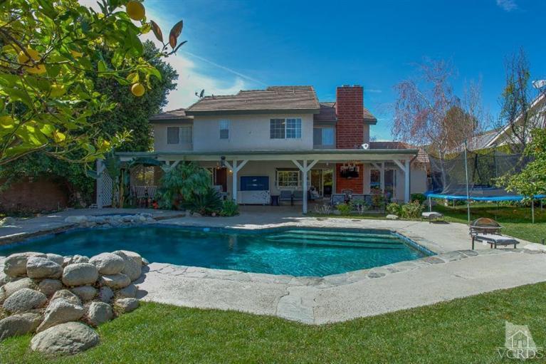 3606 Claridge Court Simi Valley, CA 93063 - Photo 55 of 58 a front view of a house with a yard table and chairs