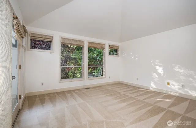 a bathroom with a shower sink vanity and mirror