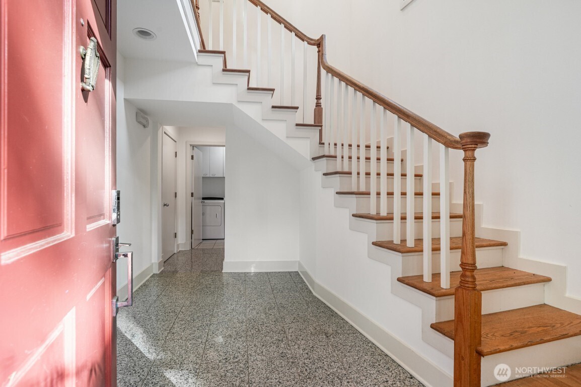 2216 19th Avenue East Seattle, WA 98112 - Photo 2 of 23 a view of entryway and hall with wooden floor