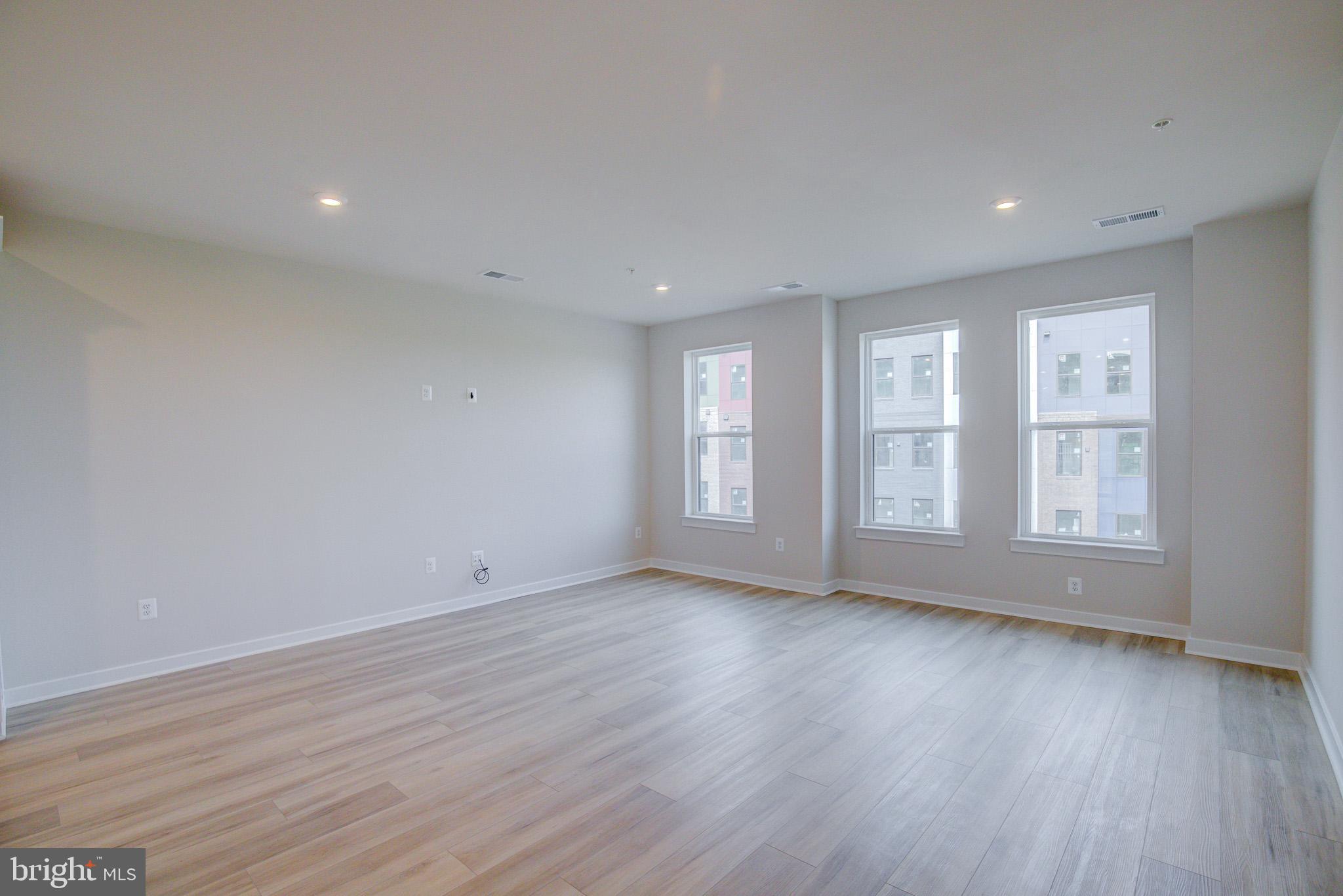 14138 Gypsum Loop Chantilly, VA 20151 - Photo 9 of 36 Open & Spacious Living Room w/ Recessed Lighting