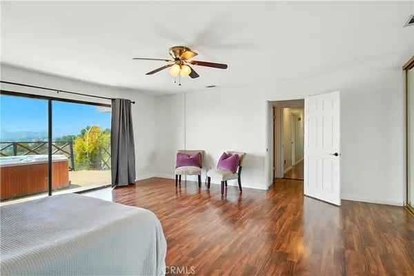 a view of a livingroom with furniture and wooden floor