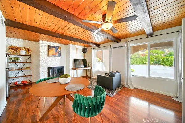 a kitchen with a table and chairs in it
