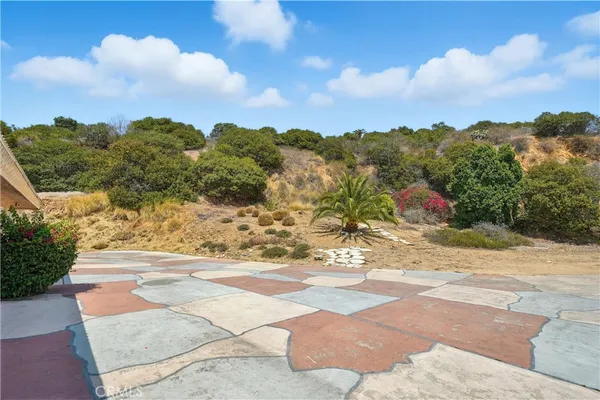 a view of a terrace with sitting area