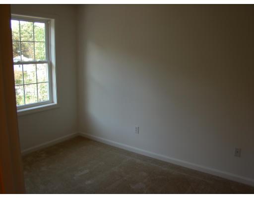 66 Parker Road Shirley, MA 01464 - Photo 20 of 24 an empty room with a window