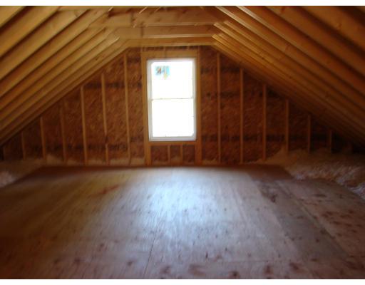 66 Parker Road Shirley, MA 01464 - Photo 23 of 24 an empty room with wooden floor and windows