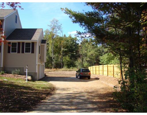 66 Parker Road Shirley, MA 01464 - Photo 3 of 24 a view of a house with a yard