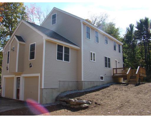 66 Parker Road Shirley, MA 01464 - Photo 4 of 24 a backyard of a house with barbeque oven