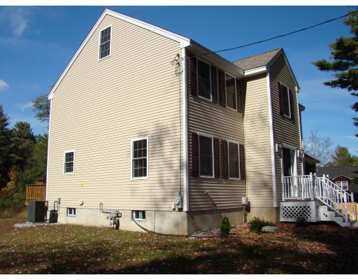 66 Parker Road Shirley, MA 01464 - Photo 7 of 24 a view of a house with a yard